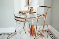 10 a copper and glass trolley for displaying your wedding cake and alcohol