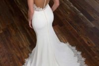 10 modern romantic mermaid wedding dress with an illusion back on buttons and a lace skirt edge