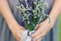 11 a grey bridesmaid’s dress will look nice with a lavender bouquet
