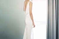 11 modern sheath wedding dress with a low back and a small train for a chic look
