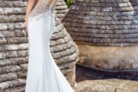 12 plain mermaid wedding dress with a silver lace illlusion back on a button row