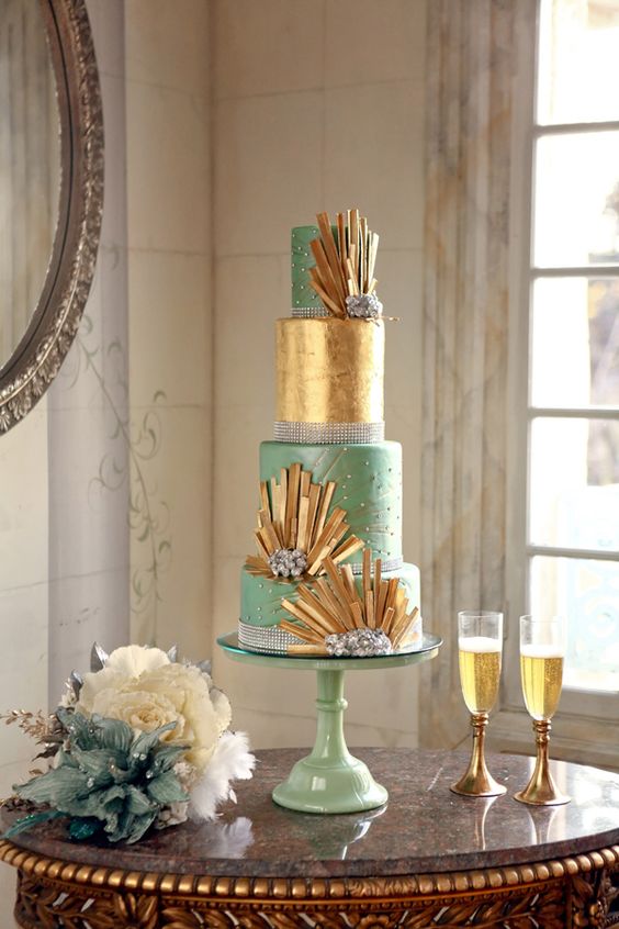 a mint and metallic gold art deco wedidng cake with spiky gold decor, beads, rhinestones