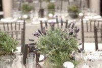 16 a soft greyish tablescape with a potted lavender centerpiece