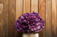 16 an elegant purple hydrangea wedding bouquet with a white ribbon bow
