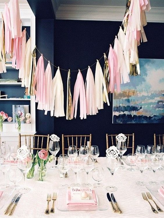 tassel garlands over the tables will highlight them and create a cool mood