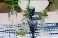 17 a shibori indigo table runner, glasses, printed napkins and plates for a boho forest wedding