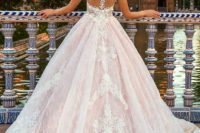 17 blush wedding ballgown with a lace racerback and a lace skirt