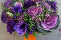 17 purple, lavender, mauve, and green bouquet with an orange stem wrap