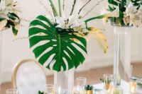 18 all wedding centerpieces with white callas, tropical leaves and delicate branches