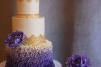 20 a chic wedding cake with an ombre purple ruffle layer, white layers with gold lace decor and purple flowers