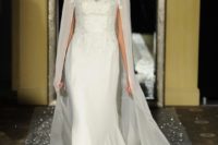 24 fit and flare embellished wedding dress with an illusion neckline and a matching cape