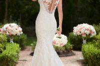 24 mermaid lace wedding dress with a button row on the illusion back