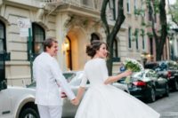 24 midi A-line wedding dress with half sleeves and bow heels for a city chic bride