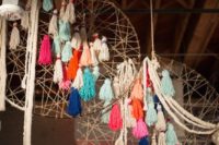 oversized dream catchers with colorful tassels for a cool rustic wedding