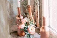 25 copper bottles as candle holders will add glam to any tablescape