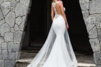 25 mermaid plain weddign gown with a lace bodice, an illusion racerback and a tulle and lace overskirt