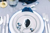 25 seaside place setting with an indog napkin and oysters