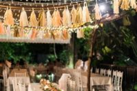 string lights and tassel garlands in matching colors create a cheerful and fun mood