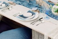 26 the coastal tablescape is accentuated with a printed indigo runner and indigo napkins
