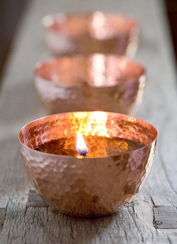 hammered copper lanterns can spruce up any tablescape