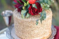 27 small gold wedding cake with red blooms and greenery