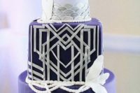28 a silver and purple wedding cake with geo details, scallops and feathers