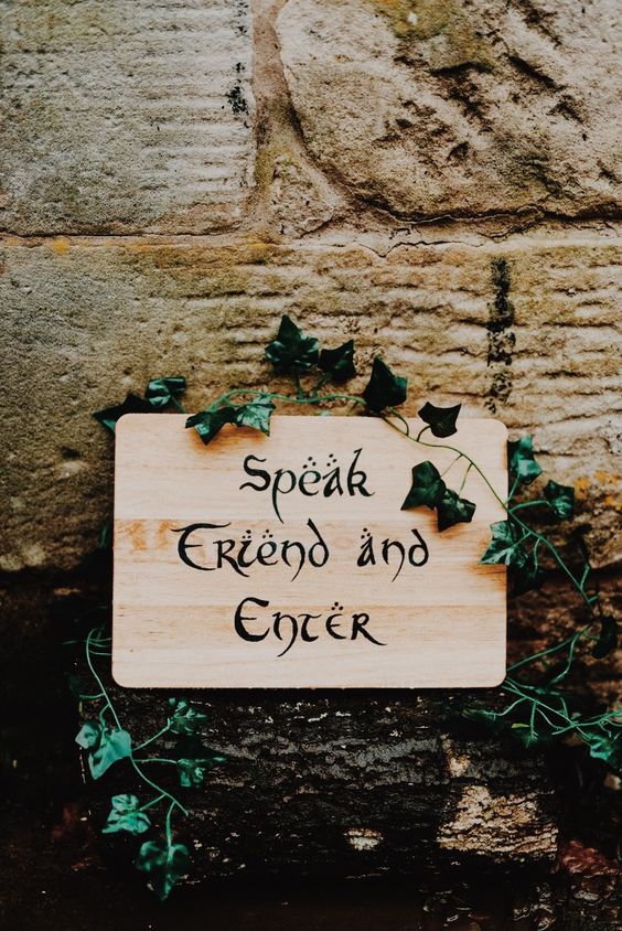 A LOTR themed sign with vines is a cool idea for a fantasy wedding, it's easy to make and looks nice