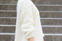 a creamy chunky knit cardigan will be a nice cover up for a modern or casual bride, it will look great both on top a short or long wedding dress