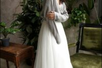 a grey wrap cardigan as a cover up for a fall or winter bride, it looks delicate and will keep you really warm