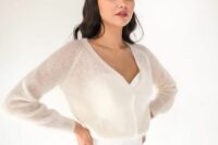 a light semi-sheer bridal cardigan with long sleeves to cover up for some outdoor shots, a nice and simple accessory