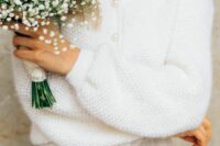 a pretty and simple textural wedding cardigan with pearl buttons is a great idea for a casual or boho bridal look
