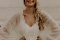 a semi-sheer neutral cardigan with pearl buttons is a lovely addition to the bridal look, it will keep you comfortable and chic