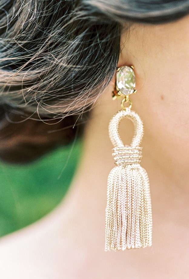 a sophisticated gold rhinestone and tassel earring with beads is a lovely idea for a bride who wants to stand out