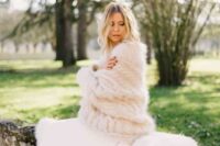 a warm cable knit cardigan like this one is a great and cozy alternative to faux fur shawls and cover ups