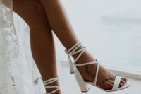 white block heel wedding shoes with braids lacing up and tassels for a chic and sexy bridal look