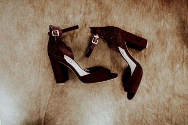 Burgundy suede shoes with block heels and ankle straps are ideal for a boho bride
