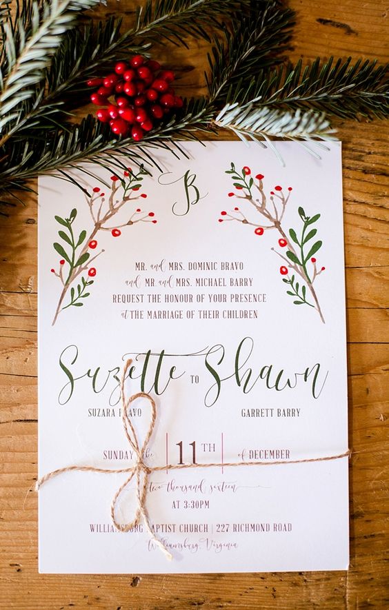 a rustic Christmas wedding invitation with a colorful print in traditional green and red and twine