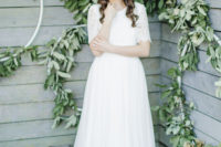 03 The bride was wearing a simple wedidng gown with a lace bodice with short sleeves and a plain skirt