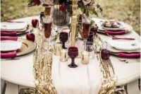 03 glam wedding tablescape with burgundy glasses, napkins and a gold sequin table runner
