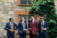 04 The groom was wearing a chic burgundy suit with a navy tie, and the groomsmen were rocking navy suits with burgundy ties and grey vests