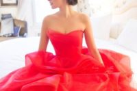 04 a fiery red wedding ballgown with a sweetheart neckline and a ruffled skirt