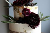 04 a gorgeous semi naked wedding cake with gold leaf, dark burgundy blooms, greenery and blackberries