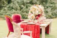 04 a luxurious red velvet wedding table runner for a sophisticated wedding tablescape