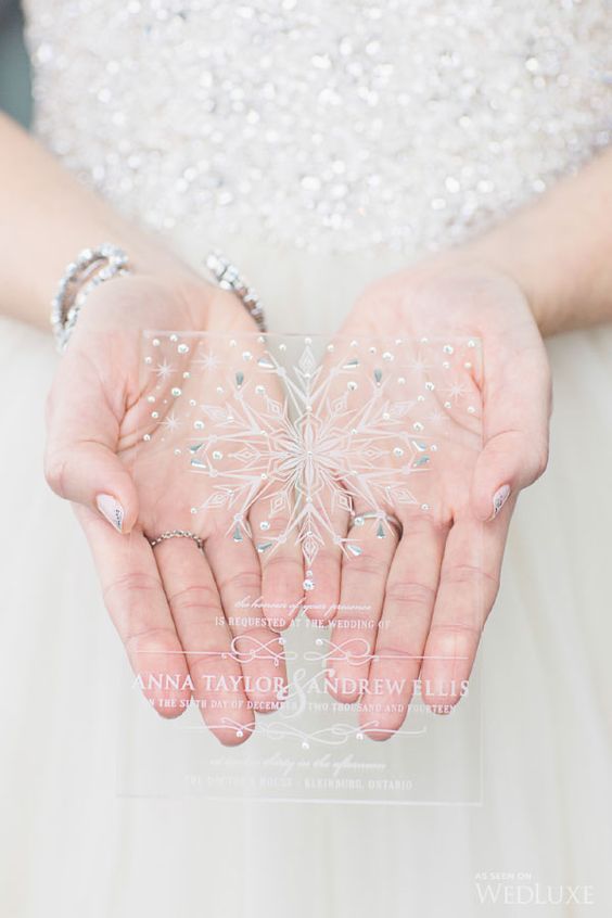 chic sheer acryl wedidng invite with rhinestones, beads and a large snowflake