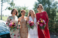 05 The bridesmaids were wearign mismatched dresses, a white striped one and a floral one