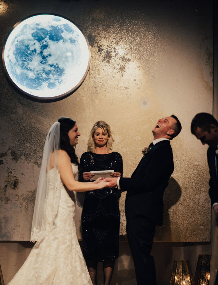 The ceremony space was decorated with a moon to fit the wedding theme