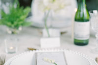 06 Neutral napkins and chic chargers looked refined and airy