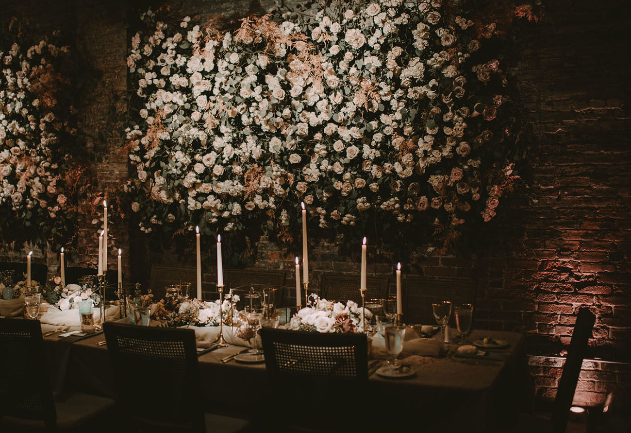 The reception space is sure to make your jaw drop when you'll see these abundant real flower walls