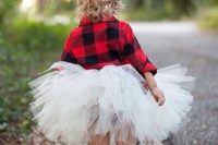 06 a flower girl in a tutu, a plaid shirt, cowboy boots and a red bow for a rustic winter wedding