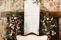 07 The ceremony space was beautifully decorated with lush blooms, calligraphy and candles